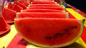 An Iraq vendor sells watermelon slices on a hot day in the capital Baghdad on May 27, 2015. AFP PHOTO / SABAH ARAR        (Photo credit should read SABAH ARAR/AFP/Getty Images)