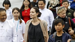 REFILE - CORRECTING IDENTITY OF JOLIE'S SON UNHCR special envoy Angelina Jolie Pitt and her son Pax arrive at Myitkyina airport in Myitkyina capital city of Kachin state, Myanmar, July 30, 2015. REUTERS/Soe Zeya Tun