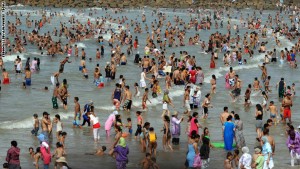 A crowd of people gather at the beach in Rabat during a heat wave in Morocco on July 15, 2012. AFP PHOTO / FADEL SENNA        (Photo credit should read FADEL SENNA/AFP/GettyImages)