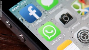 SAN FRANCISCO, CA - FEBRUARY 19:  The Facebook and WhatsApp app icons are displayed on an iPhone on February 19, 2014 in San Francisco City. Facebook Inc. announced that it will purchase smartphone-messaging app company WhatsApp Inc. for $19 billion in cash and stock.  (Photo illustration by Justin Sullivan/Getty Images)
