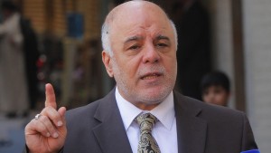Iraqi Prime Minister Haider al-Abadi speaks to reporters after a meeting with the top Shiite cleric, Grand Ayatollah Ali al-Sistani, in the Shiite holy city of Najaf, south of Baghdad, October 20, 2014.  REUTERS/Alaa Al-Marjani (IRAQ - Tags: RELIGION POLITICS)