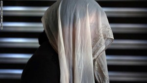 A displaced Iraqi woman from the Yazidi community poses for a picture in the northern Iraqi town of Dohuk on May 20, 2015. The Yazidis have long been one of the most vulnerable minorities in Iraq and have been particularly targeted by Islamic State jihadists, who have overrun much of the country. The United Nations said the IS may have committed genocide in trying to wipe out the Yazidi minority, in a report laying out a litany of atrocities, detailing killings, torture, rape, sexual slavery and the use of child soldiers by the extremists. AFP PHOTO / SAFIN HAMED (Photo credit should read SAFIN HAMED/AFP/Getty Images)