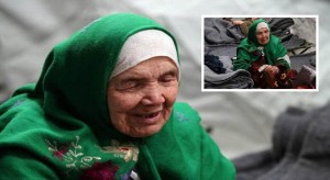 105-year old Afghan regugee Bibihal Uzbeki from Kunduz, Afghanistan, rests in Croatia's main refugee camp at Opatovac, Croatia, near the border with Serbia, Tuesday, Oct. 27, 2015. Centenarian Bibihal Uzbeki, crossed into Croatia on a stretcher from Serbia with a large group of refugees, including her son and several other relatives, among tens of thousands who have traveled across continents, fleeing war and poverty to search for a happier, safer future in Europe. (AP Photo/Marjan Vucetic)