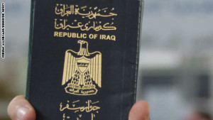 A refugee from Iraq holds his passport as he waits for his turn to discuss an issue at the United Nations High Commissioner for Refugees (UNHCR) offices in Duma, 20 kms north of Damascus, on June 19, 2010 during a visit by UNHCR chief Antonio Guterres (not seen) to inspect the distribution of aid and conditions of refugees registered by the organisation in Syria. AFP PHOTO/LOUAI BESHARA (Photo credit should read LOUAI BESHARA/AFP/Getty Images)